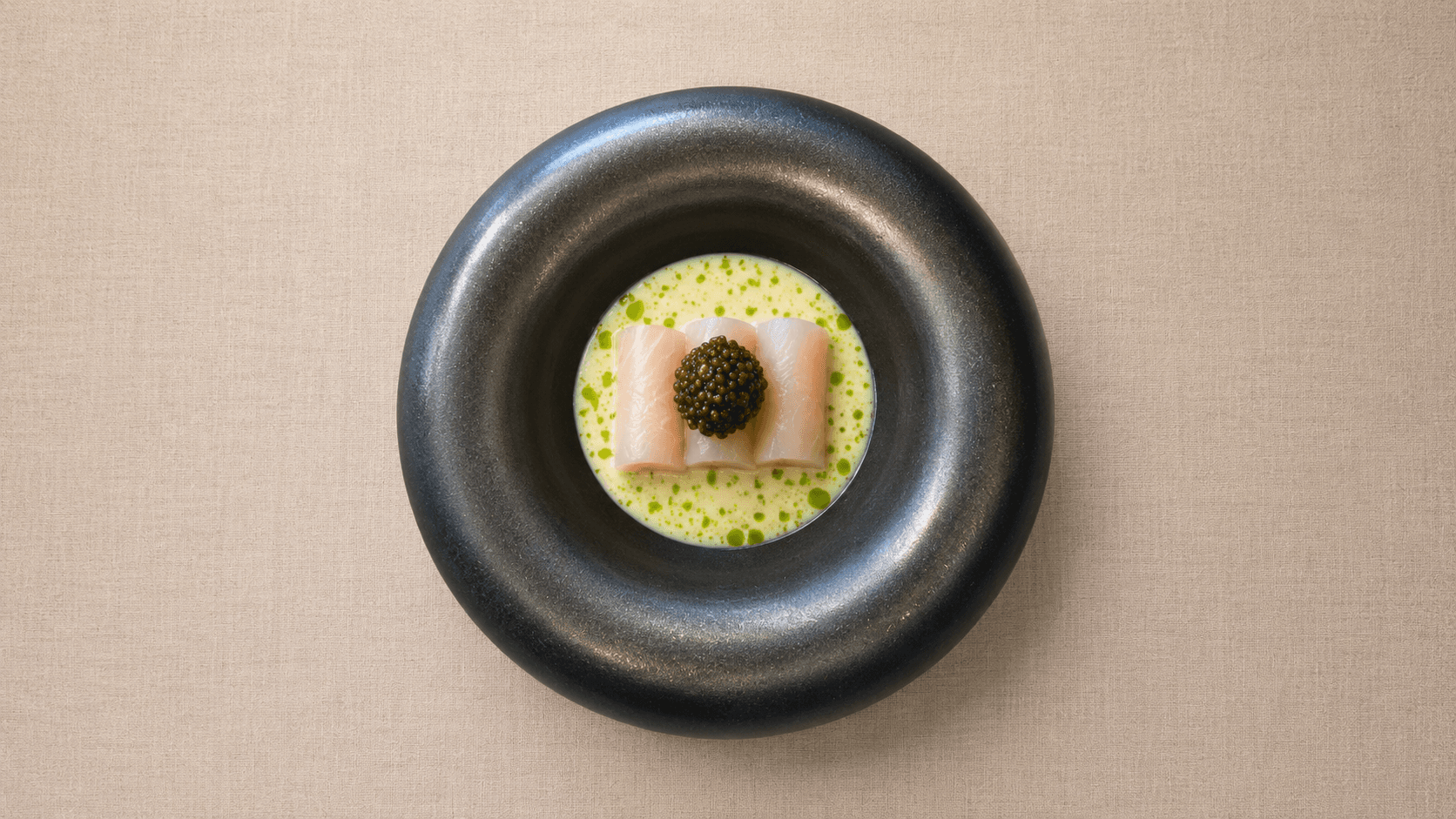 Fine dining room with plated dishes and Michelin-style restaurant ambiance